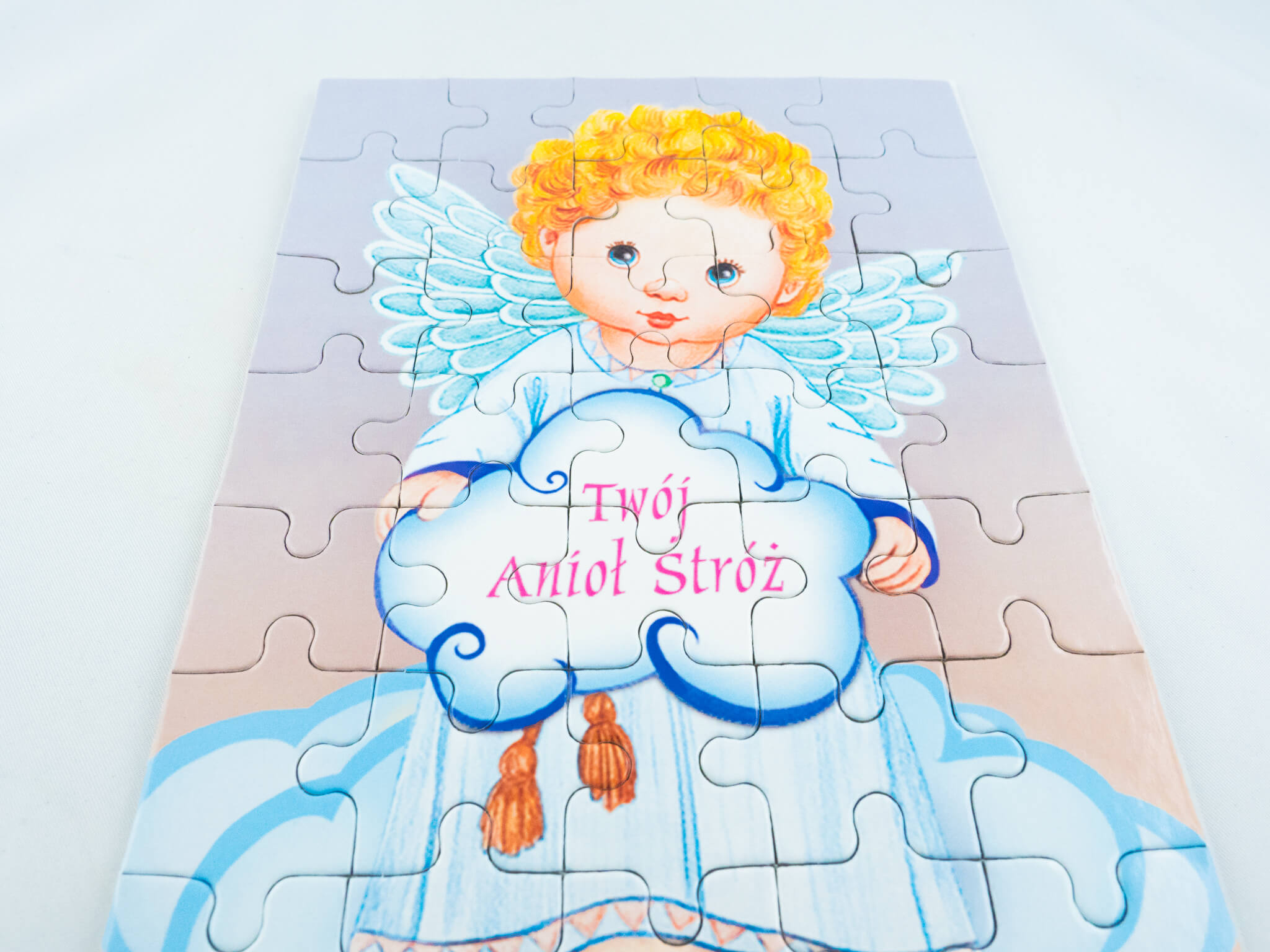 Galeria 1 puzzle anioł chłopiec
