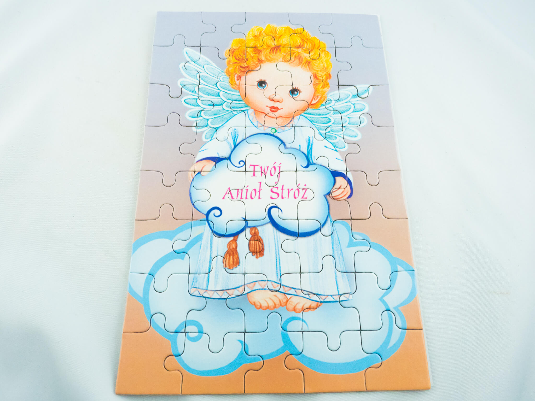 Galeria puzzle anioł chłopiec